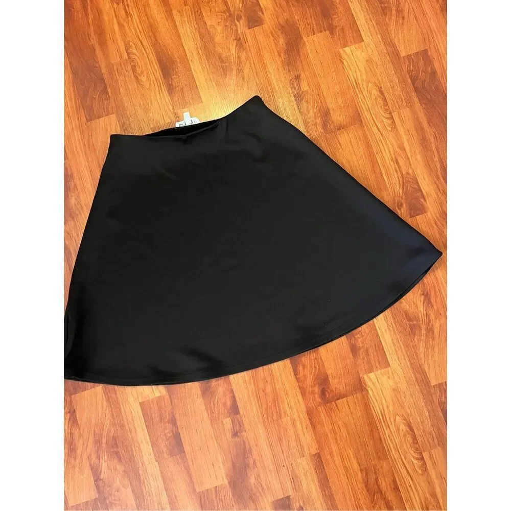 Spense black a-line slip on skirt size medium petite.